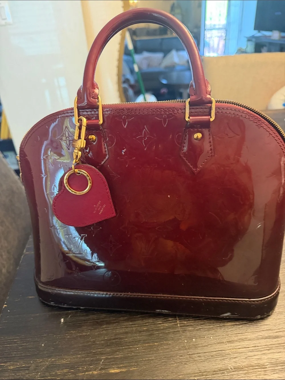 Louis Vuitton Burgundy Leather purse with Gold Hardware